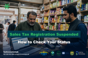 Tax & Business Compliance Services in Pakistan | Income Tax, NTN & Company Registration 11 Pakistani shopkeeper checking sales tax registration suspension with a tax consultant